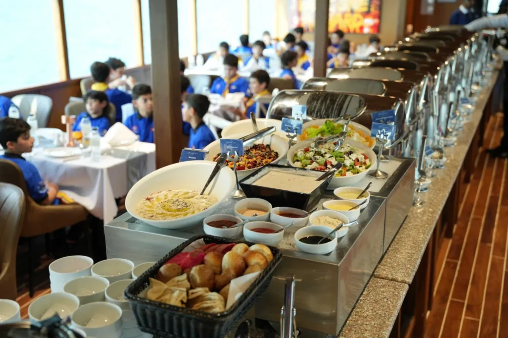 Delicious international buffet setup onboard Celeste dinner cruise Dubai Marina.
